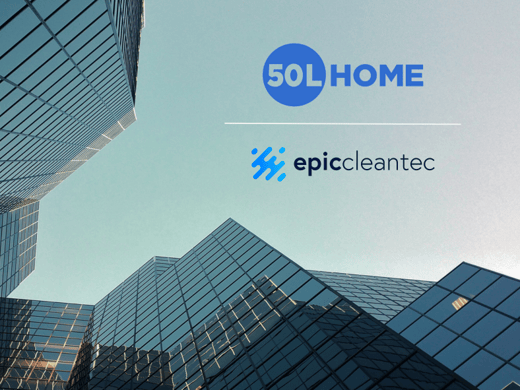 A view looking upward of high rise city buildings with the 50L Home and Epic Cleantec logos